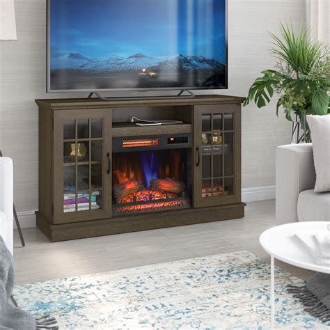 Create a warm, entertaining space in your family room with this <strong>TV stand</strong> with a built-in electric <strong>fireplace</strong>. . Lowes fireplace tv stand